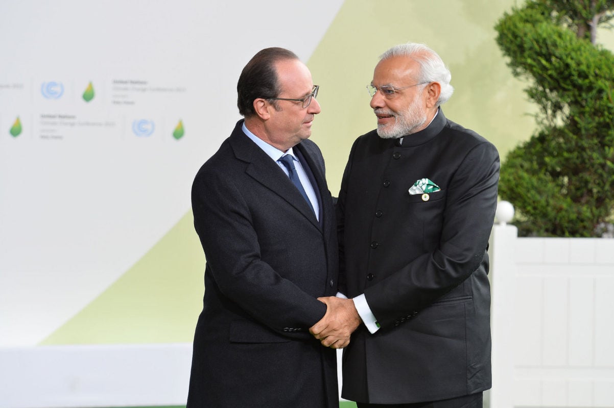 Hollande and modi at COP21 in Paris. Image: Narendra Modi official Flickr account. 