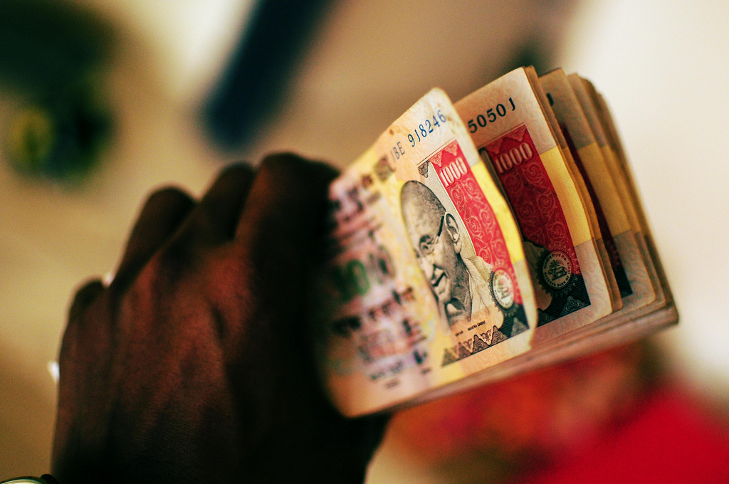 These 1,000 rupee notes will no longer be legal tender. Flickr: Gopal Vijayaraghavan